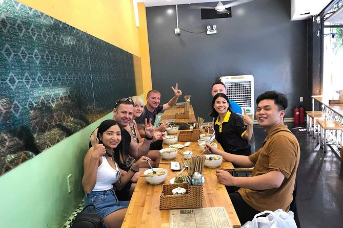 Private Street Food Tour by Scooter with Hotel Pickup - Alleys, flowers, and Saigon after dark