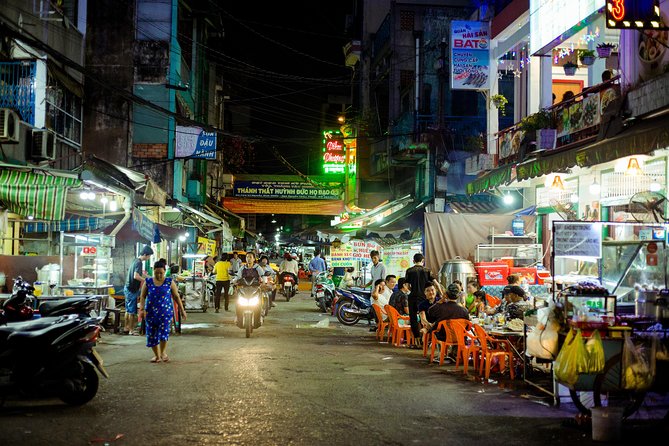 Private Vegan Food Tour By Scooter in Ho Chi Minh City - District 5 and District 4 turn the ride into a night tour