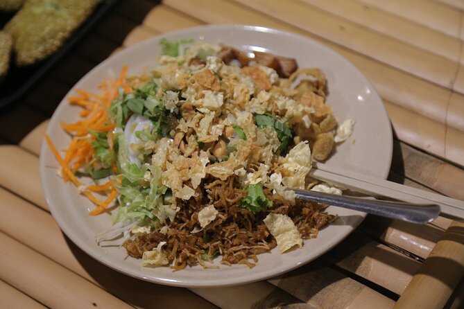 Private Vegan Food Tour in Ho Chi Minh City By Motorbike - The first tasting, near 86 Mac Dinh Chi