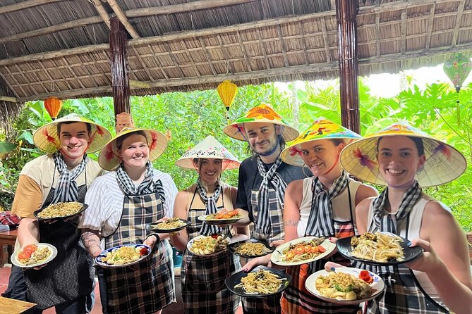 RICE PAPER Noodle Making Experience & Hoi An Cooking Class Class - Making rice paper noodles by hand