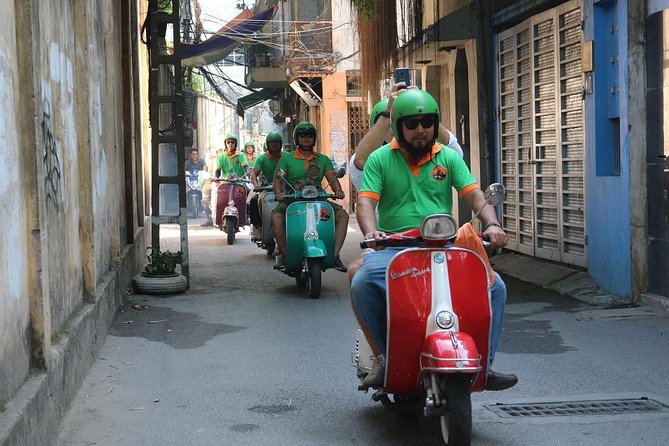 Saigon After Dark Vespa Street Food Tour + Live Music 4 hours - The guides and riders shape the experience