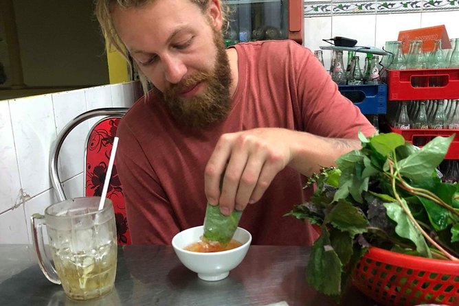 Saigon By Night and Street Food By Motorbike | Opt: Ao Dai Riders - Nguyen Trai Street: a moving city lesson