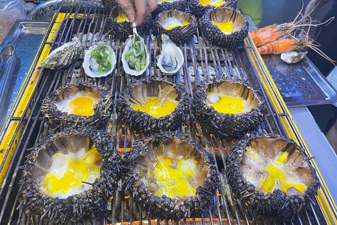 Saigon By Night and Street Food By Motorbike | Opt: Ao Dai Riders - Safety, comfort, and the Ao Dai option