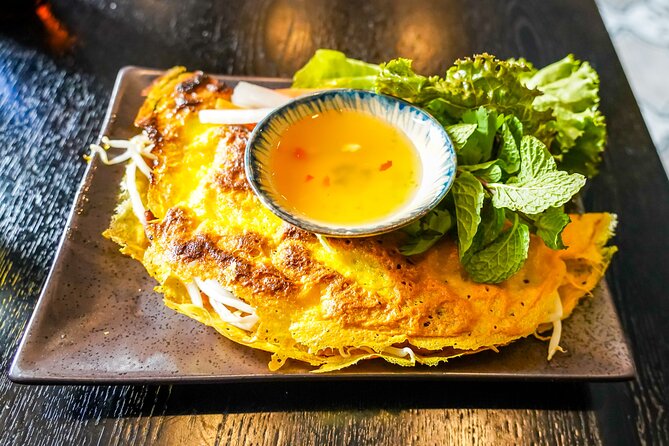 Saigon By Night and Vietnam Local Food on Motorbike - Six stops, six different tastes of Ho Chi Minh City