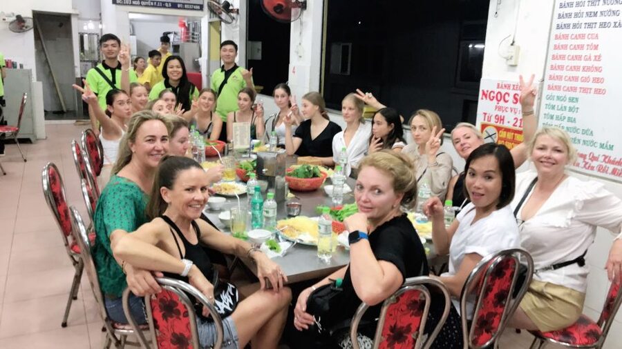 Saigon: Day-Night Sights & Local Food Tour l Female Option - Nguyen Trai Street shows everyday shopping