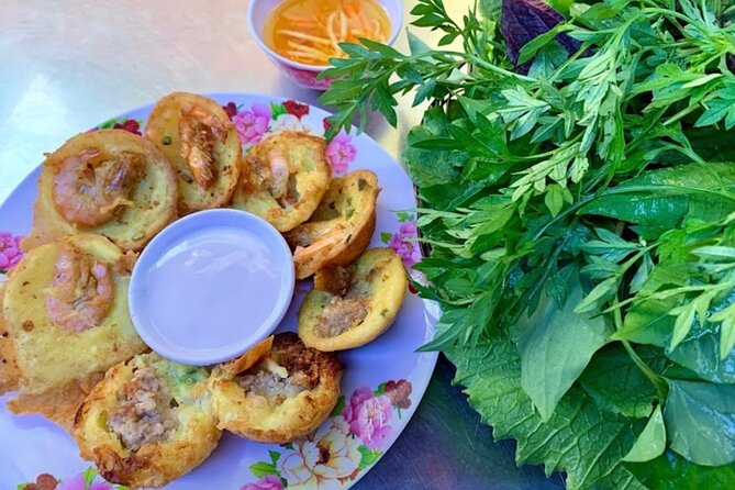 Saigon Evening Walking Street Food Tour - Rice pancakes at a neighborhood restaurant