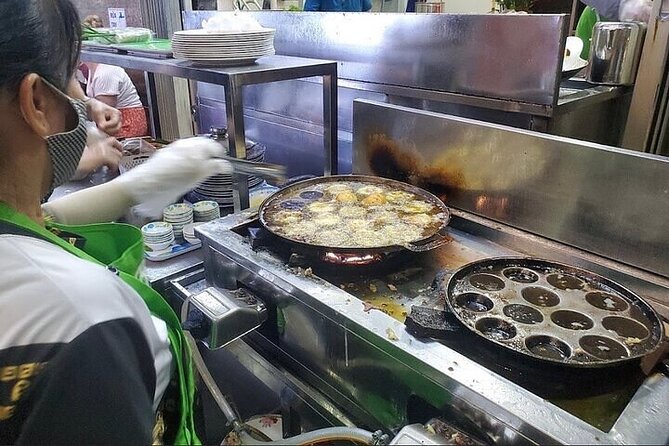 Saigon Evening Walking Street Food Tour - The night flower market and coconut dessert