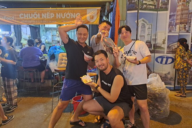 Saigon Food Tour by Scooter with Eleven Tastings - Ho Thi Ky Flower Market adds color and seafood