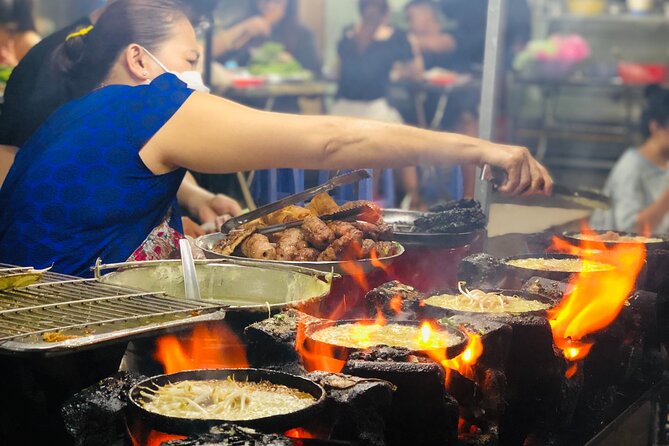 Saigon Food Tour by Scooter with Eleven Tastings - District 10 turns you into a bánh xèo cook