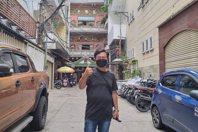 Saigon Private/Small Group Walking Food Tour with 13 Tastings - Ho Thi Ky Flower Market and six bold snacks