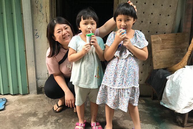 Saigon Slum tour and Saigon Chillspots by motorbike/ Aodai rider - Lotus flowers and Saigon’s major flower market