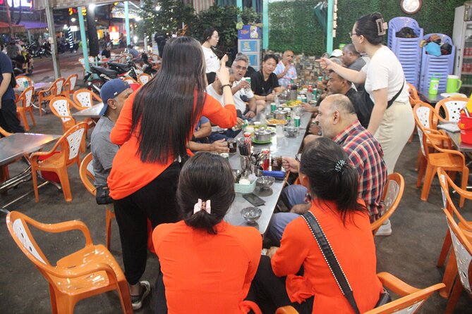 Saigon Vespa By Night Street Food With Female Riders Ao Dai - Riding through Ho Chi Minh City when traffic thins