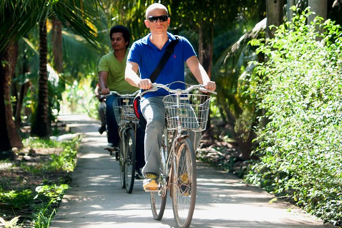 Small-Group Authentic Mekong Delta Day Trip from Ho Chi Minh City - Entering the shady canals by sampan