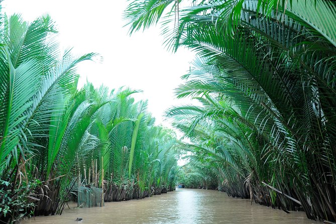 Small-Group Authentic Mekong Delta Day Trip from Ho Chi Minh City - Choosing between a xe-loi ride and a bicycle
