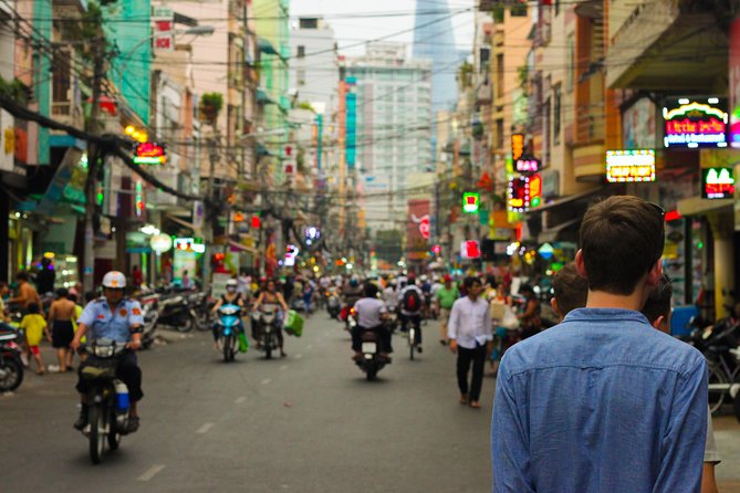 Small group Saigon Inside Out by Motorbike for 3 Hours - Ho Thi Ky Flower Market and the local side of the city