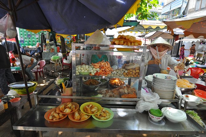 Small-group Street Food Lover by Motorbike (04 hours) - Ho Thi Ky Flower Market and its food stalls