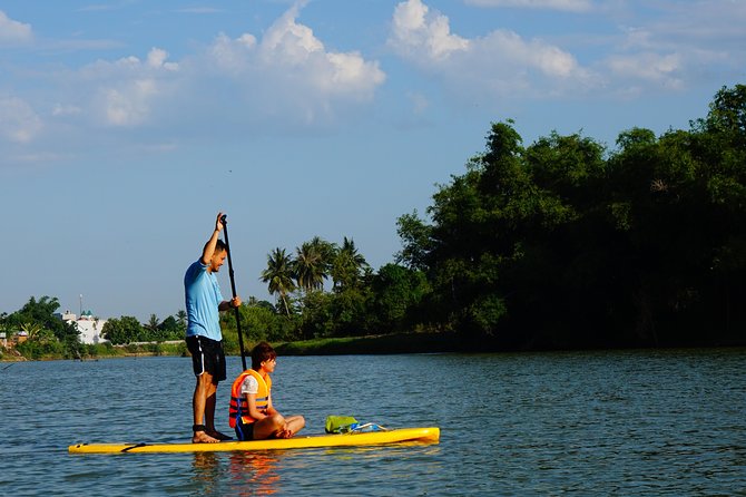 Stand Up Paddle Boarding and Sunset Watching on Cai River - Who should book this outing