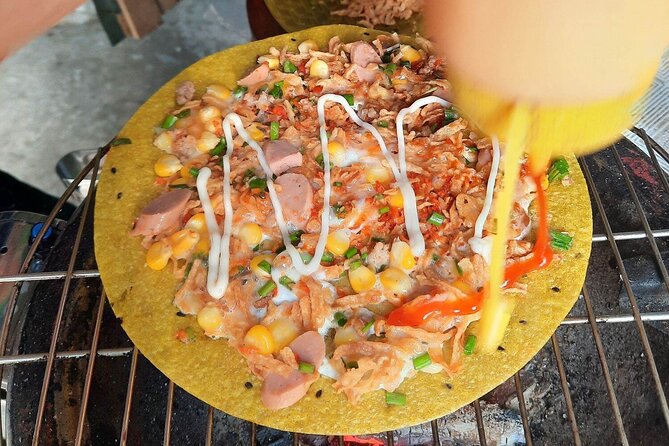 Super Niche Walking Street Food Tour in Ho Chi Minh City - Walking, taxis, heat, and street safety