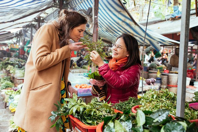 The 10 Tastings of Hanoi With Locals: Private Street Food Tour - Pho, bánh mì, and the French connection