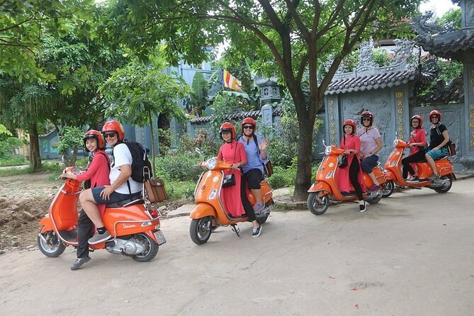 The insider's Hanoi + Train Street 4,5 Hours Female Ao Dai Riders - Ba Dinh Square and the French-era sights