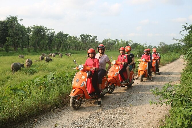 The insider's Hanoi + Train Street 4,5 Hours Female Ao Dai Riders - Returning through Hanoi to the Old Quarter