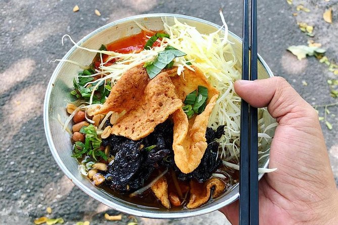 Top Notch Street Food Motorbike Tour In Ho Chi Minh City - Starting at Le Van Tam Park with coconut juice