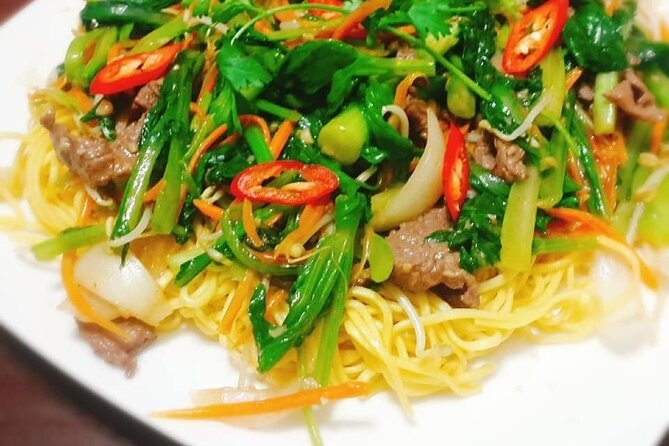 Top-rated Home Cooking Class with a River View AC Kitchen - Cooking above the Saigon River