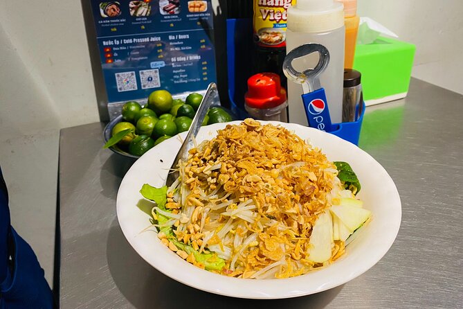 Vegan Street Food & Stories of Hanoi - Ta Hien Street after dark