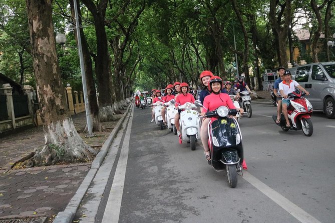 Vespa City Tour &Train Street Female With Ao Dai Riders 4,5 Hours - Starting near the Opera House