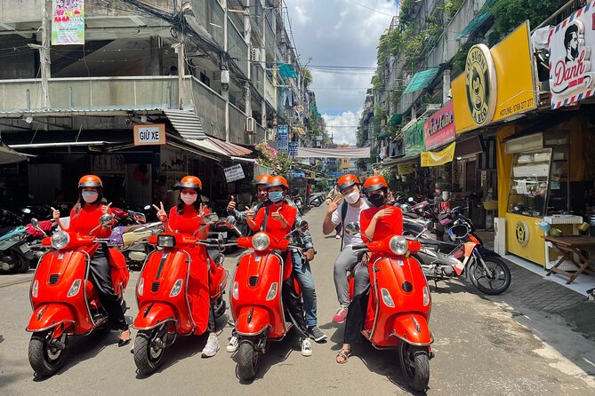 Vespa Female Ao Dai riders Night Street Food + See Train Street - Starting in the Old Quarter at 6:00 p.m.