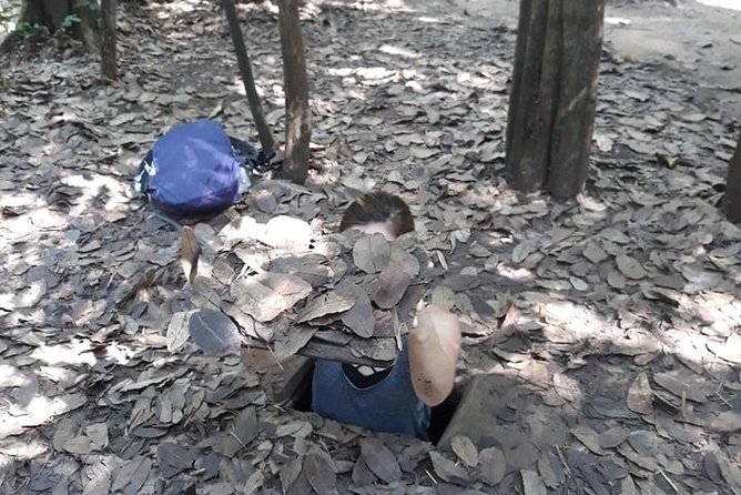 Vietnamese Cooking Class and Cu Chi Tunnels Tour from Ho Chi Minh City - Picking ingredients at the organic farm