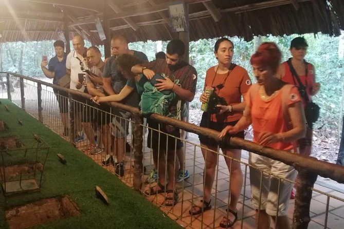 VIP Tour Cuchi Tunnels & Mekong Delta Cruise Full Day Group 12pax - Crawling through the Cu Chi Tunnels