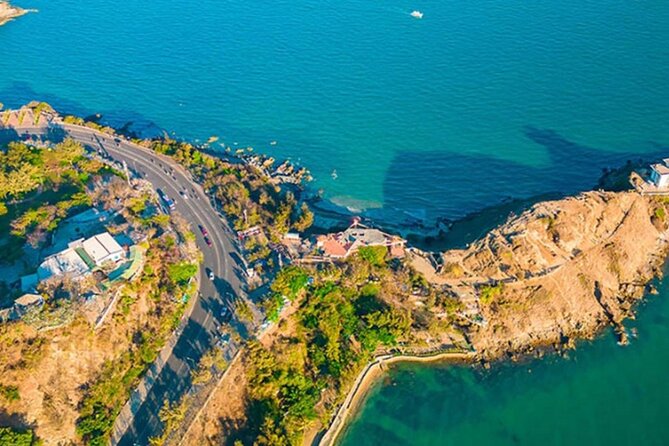 Vung Tau Full-Day Tour with Beach, Christ Statue & White Palace - Taking a slow walk on Thuy Van Beach